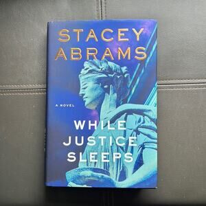 Novel Book | While Justice Sleeps by Stacey Abrams